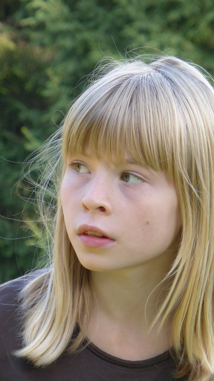 Girl with a hesitant look on her face